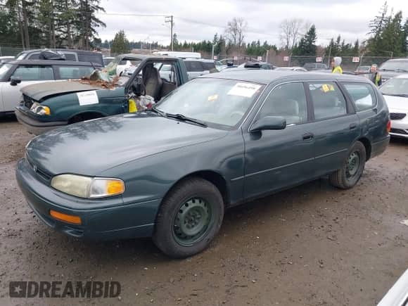 1996 Toyota Camry LE with VIN 4T1EF12K9TU116427, listed as a IAAI auction lot 38696498 with 242,599 mi miles and . Bid and sale history available at DreamBid. Image 16.