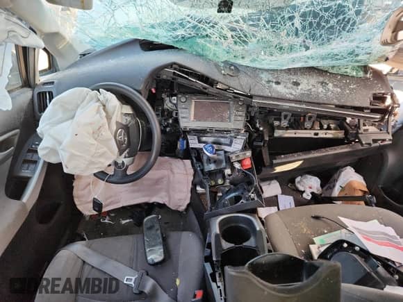 2014 Toyota Prius Four z VIN JTDKN3DU7E1861122, wystawiony jako Copart lot #85309575 z przebiegiem Nie podano mil oraz Szkoda całkowita • Salvage title. Historia ofert i sprzedaży dostępna na DreamBid. Obrazek 8.