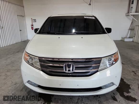 2013 Honda Odyssey Touring с VIN 5FNRL5H90DB060222, выставлен на аукционе Copart как лот 86769145 с пробегом 166 753 миль миль и Списание • Salvage title. История ставок и продаж доступна на DreamBid. Изображение 5.