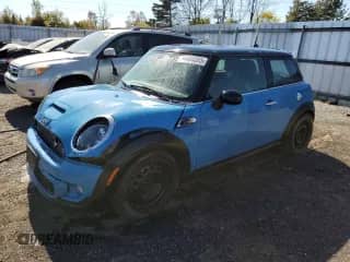 2013 MINI Hardtop S with VIN WMWSV3C55DT391893, listed as a Copart auction lot 84464085 with 122,954 mi miles and Salvage title. Bid and sale history available at DreamBid. Image 1.