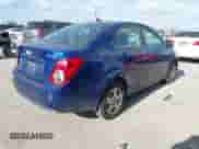2013 Chevrolet Sonic LS with VIN 1G1JA5SG0D4140257, listed as a IAAI auction lot 42821127 with 138,444 mi miles and . Bid and sale history available at DreamBid. Image 4.