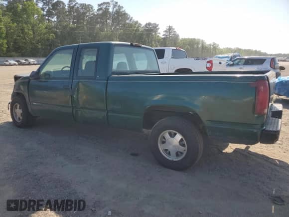 1998 GMC Sierra 1500 z VIN 1GTEC19W4WE521888, wystawiony jako Copart lot #53161505 z przebiegiem 985 004 mil mil oraz Szkoda całkowita • Salvage title. Historia ofert i sprzedaży dostępna na DreamBid. Obrazek 2.
