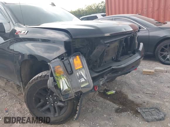 2021 Chevrolet Silverado 1500 Custom Trail Boss z VIN 3GCPYCEF4MG482172, wystawiony jako IAAI lot #43228808 z przebiegiem 61 961 mil mil oraz . Historia ofert i sprzedaży dostępna na DreamBid. Obrazek 6.