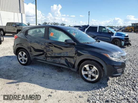 2021 Honda HR-V LX с VIN 3CZRU5H33MM702947, выставлен на аукционе Copart как лот 83814025 с пробегом 162 560 миль миль и На запчасти • Non repairable. История ставок и продаж доступна на DreamBid. Изображение 4.