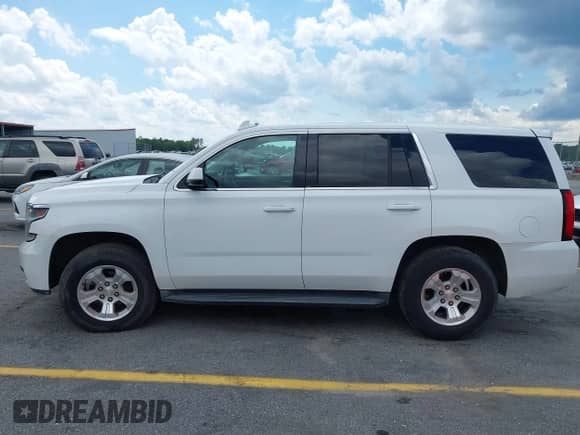 2015 Chevrolet Tahoe Commercial with VIN 1GNLC2EC1FR721538, listed as a IAAI auction lot 42274601 with 138,991 mi miles and . Bid and sale history available at DreamBid. Image 14.