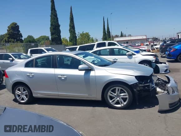 2015 Volvo S60 T5 Drive-E Premier with VIN YV126MFB8F2316406, listed as a IAAI auction lot 42517670 with 80,027 mi miles and . Bid and sale history available at DreamBid. Image 14.