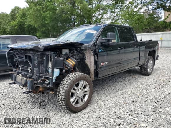 2016 Chevrolet Silverado 2500HD LT with VIN 1GC1KVE84GF134916, listed as a Copart auction lot 61627895 with 120,121 mi miles and Salvage title. Bid and sale history available at DreamBid. Image 1.