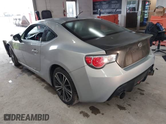 2013 Scion FR-S z VIN JF1ZNAA12D2730675, wystawiony jako IAAI lot #42321319 z przebiegiem 83 074 mil mil oraz . Historia ofert i sprzedaży dostępna na DreamBid. Obrazek 3.