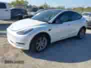 2021 Tesla Model Y Long Range with VIN 5YJYGDEE6MF139180, listed as a IAAI auction lot 43345582 with 61,071 mi miles and . Bid and sale history available at DreamBid. Image 2.