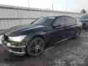 2018 BMW 7 Series 740e xDrive with VIN WBA7J2C59JG938180, listed as a Copart auction lot 85343184 with 35,860 mi miles and Salvage title. Bid and sale history available at DreamBid. Image 1.