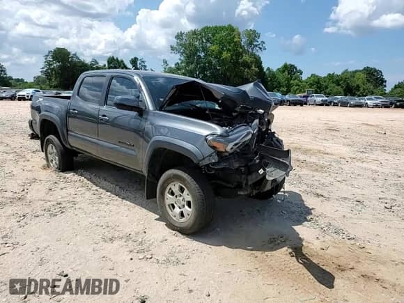 2016 Toyota Tacoma SR z VIN 3TMCZ5AN0GM041696, wystawiony jako Copart lot #66161505 z przebiegiem 125 837 mil mil oraz Szkoda całkowita • Salvage title. Historia ofert i sprzedaży dostępna na DreamBid. Obrazek 14.