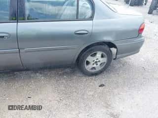 2005 Chevrolet Malibu Classic z VIN 1G1ND52F35M248471, wystawiony jako IAAI lot #42762966 z przebiegiem Nie podano mil oraz . Historia ofert i sprzedaży dostępna na DreamBid. Obrazek 6.