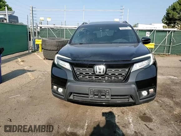 2019 Honda Passport Elite with VIN 5FNYF8H08KB000384, listed as a Copart auction lot 66898195 with 65,105 mi miles and Salvage title. Bid and sale history available at DreamBid. Image 10.