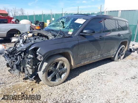 2023 Jeep Grand Cherokee Altitude with VIN 1C4RJKAG4P8769673, listed as a IAAI auction lot 41822641 with 59,535 mi miles and . Bid and sale history available at DreamBid. Image 2.