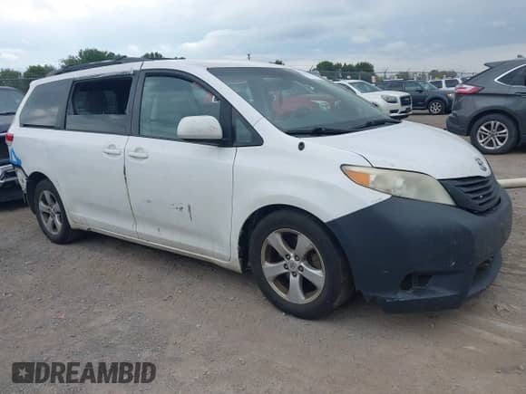 2012 Toyota Sienna LE AAS with VIN 5TDKK3DC0CS261672, listed as a IAAI auction lot 43256260 with 477,784 mi miles and . Bid and sale history available at DreamBid. Image 1.