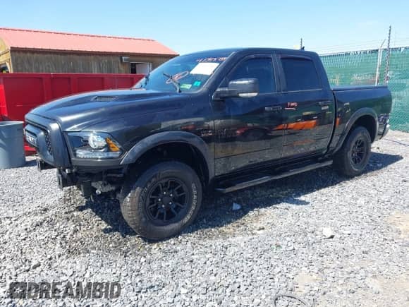 2018 Ram 1500 Rebel with VIN 1C6RR7YT4JS145768, listed as a IAAI auction lot 41593734 with 66,820 mi miles and . Bid and sale history available at DreamBid. Image 2.