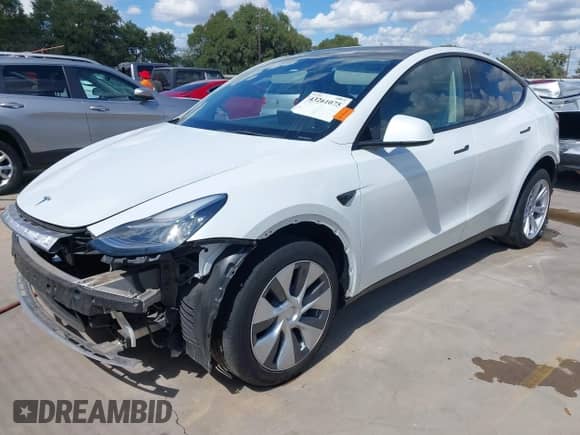 2023 Tesla Model Y Long Range with VIN 7SAYGDEE6PA078790, listed as a IAAI auction lot 43261075 with 20,370 mi miles and . Bid and sale history available at DreamBid. Image 24.