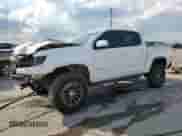 2019 Chevrolet Colorado 4WD ZR2 with VIN 1GCGTEEN3K1357354, listed as a Copart auction lot 71485025 with 86,696 mi miles and Salvage title. Bid and sale history available at DreamBid. Image 1.