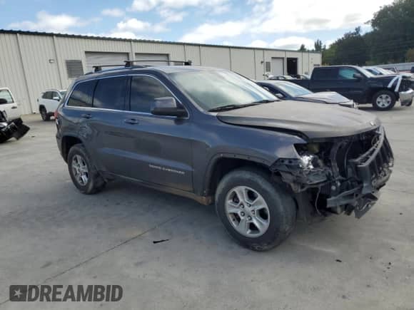 2014 Jeep Grand Cherokee Laredo with VIN 1C4RJEAG4EC206845, listed as a Copart auction lot 72047285 with 235,222 mi miles and Salvage title. Bid and sale history available at DreamBid. Image 4.