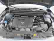 2023 Mazda CX-5 S Carbon Edition z VIN JM3KFBCM1P0132803, wystawiony jako IAAI lot #43128566 z przebiegiem 37 967 mil mil oraz . Historia ofert i sprzedaży dostępna na DreamBid. Obrazek 10.