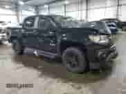 2021 Chevrolet Colorado 4WD Z71 with VIN 1GCGTDEN8M1171810, listed as a Copart auction lot 57409115 with 100,579 mi miles and Salvage title. Bid and sale history available at DreamBid. Image 4.