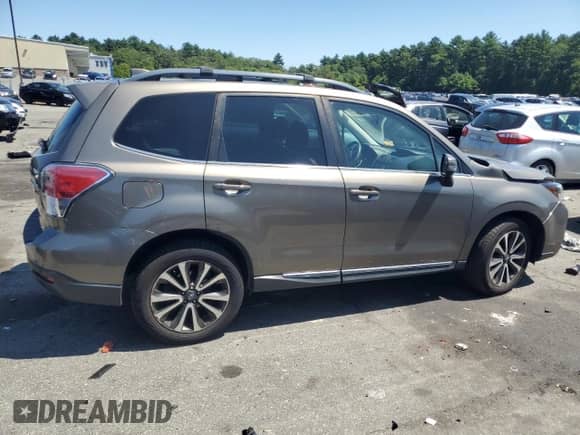 2017 Subaru Forester Touring z VIN JF2SJGWC1HH587274, wystawiony jako Copart lot #68068555 z przebiegiem Nie podano mil oraz Szkoda całkowita • Salvage title. Historia ofert i sprzedaży dostępna na DreamBid. Obrazek 3.