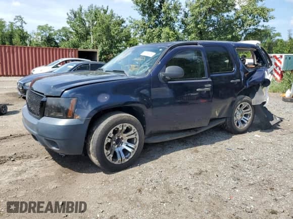2007 Chevrolet Tahoe Police с VIN 1GNEC030X7R390076, выставлен на аукционе Copart как лот 66219415 с пробегом 235 406 миль миль и Списание • Salvage title. История ставок и продаж доступна на DreamBid. Изображение 1.