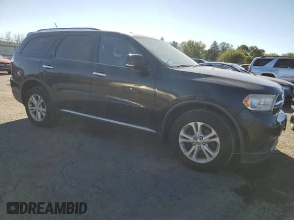 2013 Dodge Durango Crew with VIN 1C4RDJDG4DC700942, listed as a Copart auction lot 84470185 with 219,098 mi miles and Clean title. Bid and sale history available at DreamBid. Image 4.