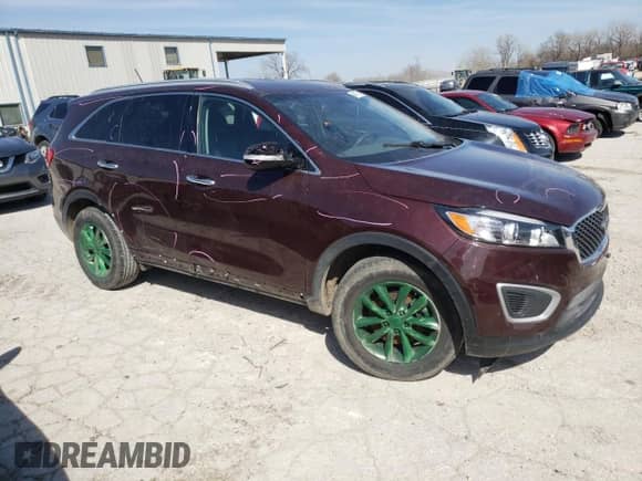2018 Kia Sorento LX with VIN 5XYPG4A58JG394628, listed as a Copart auction lot 48447934 with 105,354 mi miles and Salvage title. Bid and sale history available at DreamBid. Image 4.