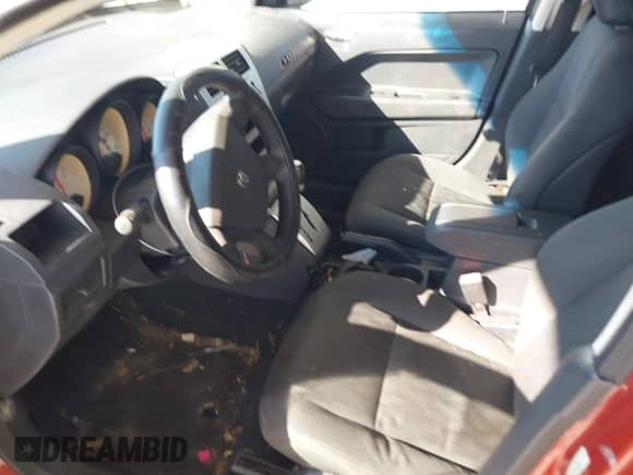 2008 Dodge Caliber SE with VIN 1B3HB28B78D610286, listed as a IAAI auction lot 43510653 with 208,119 mi miles and . Bid and sale history available at DreamBid. Image 15.