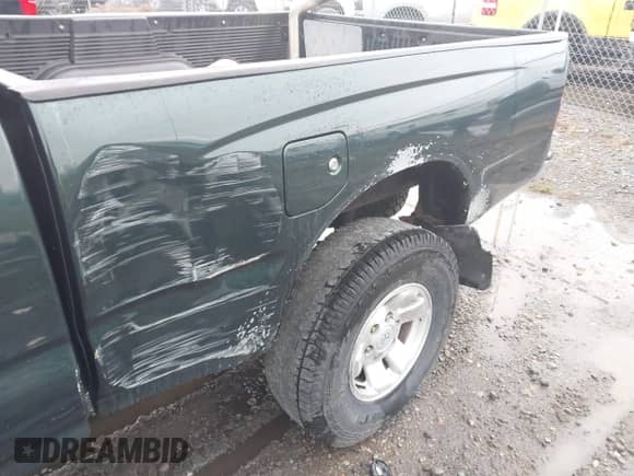 2000 Toyota Tacoma with VIN 4TAWM72N6YZ683194, listed as a IAAI auction lot 42113384 with 174,601 mi miles and . Bid and sale history available at DreamBid. Image 6.