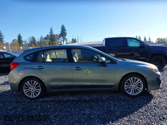 2014 Subaru Impreza Premium with VIN JF1GPAE61E8275730, listed as a IAAI auction lot 43409579 with 68,890 mi miles and . Bid and sale history available at DreamBid. Image 14.