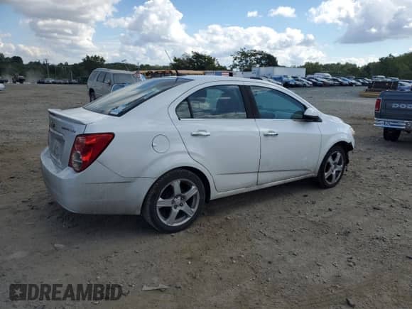 2013 Chevrolet Sonic LTZ with VIN 1G1JE5SG4D4172679, listed as a Copart auction lot 71161245 with 158,691 mi miles and Salvage title. Bid and sale history available at DreamBid. Image 3.