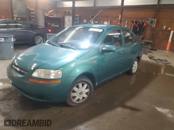 2004 Chevrolet Aveo LS with VIN KL1TJ52604B148255, listed as a Copart auction lot 52167815 with 67,162 mi miles and Clean title. Bid and sale history available at DreamBid. Image 1.