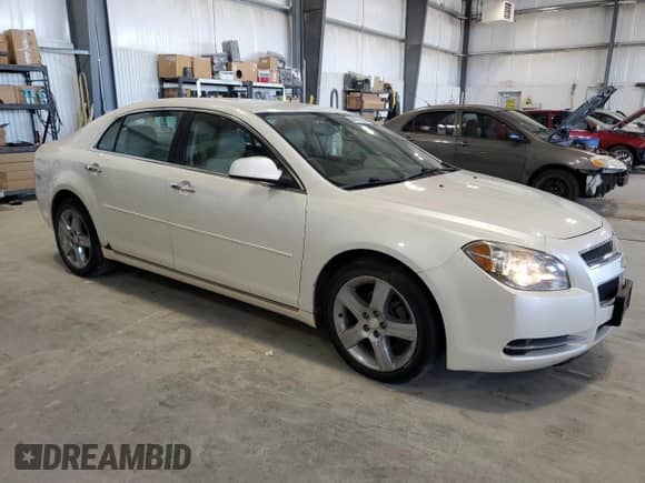 2012 Chevrolet Malibu 3LT z VIN 1G1ZF5E73CF206898, wystawiony jako Copart lot #64881245 z przebiegiem 142 977 mil mil oraz Czysty tytuł • Clean title. Historia ofert i sprzedaży dostępna na DreamBid. Obrazek 4.