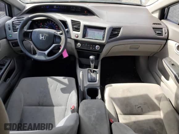 2012 Honda Civic with VIN 2HGFB2F22CH515706, listed as a Copart auction lot 71010745 with 181,438 mi miles and Salvage title. Bid and sale history available at DreamBid. Image 8.