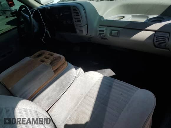 1996 GMC Sierra 1500 с VIN 1GTEC14W2TZ514059, выставлен на аукционе Copart как лот 57124765 с пробегом 179 718 миль миль и Списание • Salvage title. История ставок и продаж доступна на DreamBid. Изображение 8.
