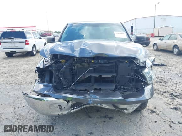 2019 Ram 1500 Tradesman z VIN 1C6RR7KG2KS681728, wystawiony jako IAAI lot #42823098 z przebiegiem 83 446 mil mil oraz . Historia ofert i sprzedaży dostępna na DreamBid. Obrazek 13.