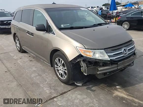 2012 Honda Odyssey LX z VIN 5FNRL5H2XCB078504, wystawiony jako Copart lot #71738495 z przebiegiem 155 321 mil mil oraz Szkoda całkowita • Salvage title. Historia ofert i sprzedaży dostępna na DreamBid. Obrazek 15.