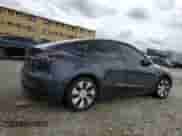 2024 Tesla Model Y с VIN 7SAYGDED6RF018828, выставлен на аукционе Copart как лот 71609855 с пробегом 21 820 миль миль и На запчасти • Non repairable. История ставок и продаж доступна на DreamBid. Изображение 3.
