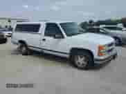 1997 Chevrolet Silverado 1500 with VIN 1GCEC14RXVZ124680, listed as a Copart auction lot 80872365 with 158,021 mi miles and Salvage title. Bid and sale history available at DreamBid. Image 4.
