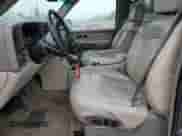 2002 Chevrolet Tahoe LT with VIN 1GNEK13Z42J246098, listed as a Copart auction lot 71029665 with 200,345 mi miles and Salvage title. Bid and sale history available at DreamBid. Image 7.