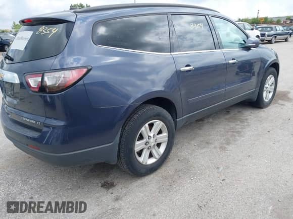 2013 Chevrolet Traverse LT z VIN 1GNKRGKD5DJ178629, wystawiony jako IAAI lot #42838354 z przebiegiem 181 140 mil mil oraz . Historia ofert i sprzedaży dostępna na DreamBid. Obrazek 4.