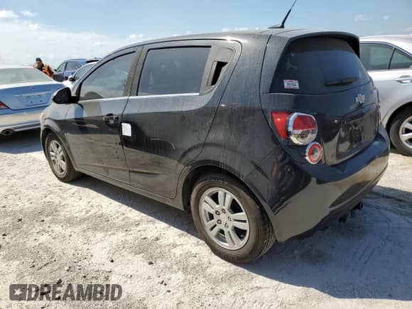 2014 Chevrolet Sonic LT z VIN 1G1JD6SBXE4103557, wystawiony jako Copart lot #76201694 z przebiegiem Nie podano mil oraz Szkoda całkowita • Salvage title. Historia ofert i sprzedaży dostępna na DreamBid. Obrazek 2.