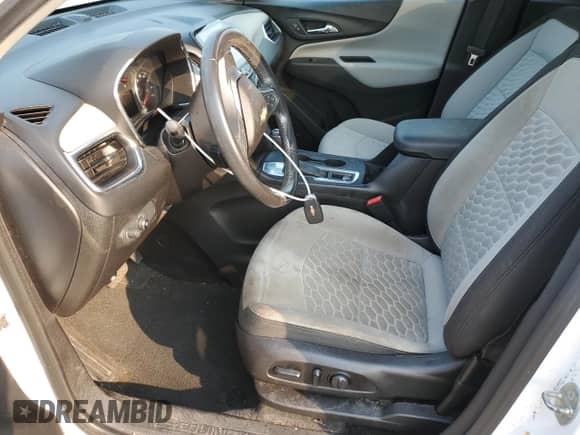 2018 Chevrolet Equinox LT with VIN 2GNAXJEV7J6238115, listed as a Copart auction lot 67173255 with 59,995 mi miles and Clean title. Bid and sale history available at DreamBid. Image 7.