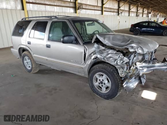 2004 Chevrolet Blazer LS z VIN 1GNDT13X84K120850, wystawiony jako Copart lot #72561234 z przebiegiem 188 094 mil mil oraz Szkoda całkowita • Salvage title. Historia ofert i sprzedaży dostępna na DreamBid. Obrazek 4.