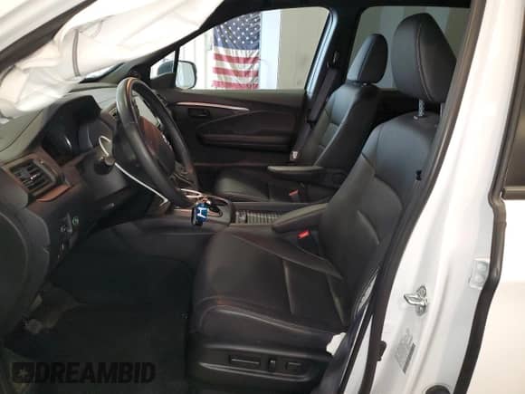 2023 Honda Passport EX-L with VIN 5FNYF8H52PB017538, listed as a Copart auction lot 68320415 with 31,933 mi miles and Salvage title. Bid and sale history available at DreamBid. Image 7.