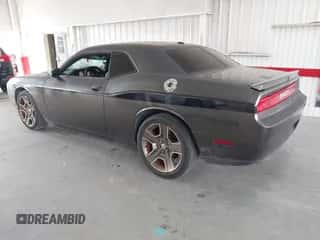 2013 Dodge Challenger R/T Plus with VIN 2C3CDYBT3DH552055, listed as a IAAI auction lot 43238290 with 129,265 mi miles and . Bid and sale history available at DreamBid. Image 3.