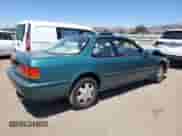 1993 Honda Accord with VIN 1HGCB7274PA015603, listed as a Copart auction lot 67778705 with 144,447 mi miles and Salvage title. Bid and sale history available at DreamBid. Image 3.