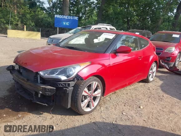2016 Hyundai Veloster z VIN KMHTC6AD0GU264343, wystawiony jako IAAI lot #42531011 z przebiegiem 105 607 mil mil oraz . Historia ofert i sprzedaży dostępna na DreamBid. Obrazek 2.